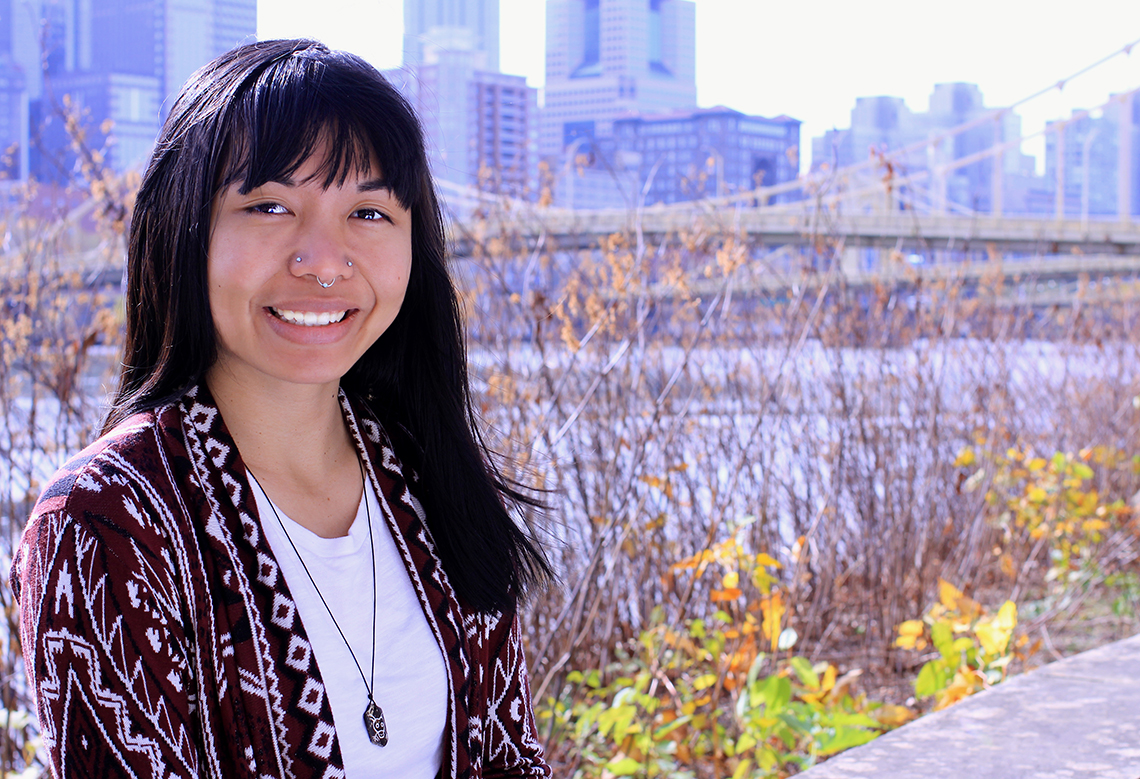 photo of Yvette with Pittsburgh in the background